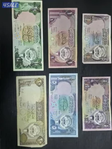 أوراق نقدية قديمة من فئات 20 دينارًا، 10 دنانير، 5 دنانير، دينار واحد،
